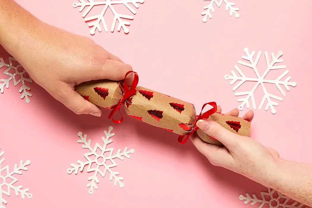 Homemade Christmas crackers made with brown kraft paper